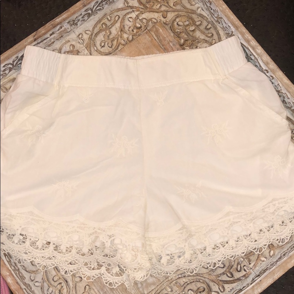 Cream shorts- size M